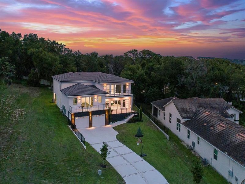 Front exterior of a new home in , Clermont, FL, highlighting curb appeal (Image 36). Front exterior of a new home in , Clermont, FL, highlighting curb appeal (Image 36).