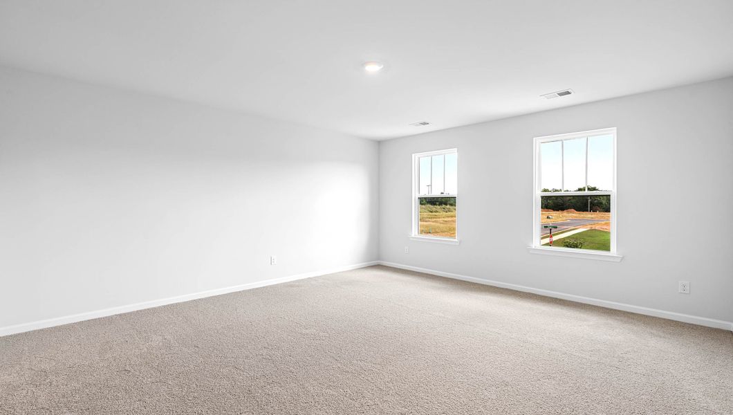 Spacious, unfurnished interior of a new home in Bentley Park, Greenwood (Image 28).