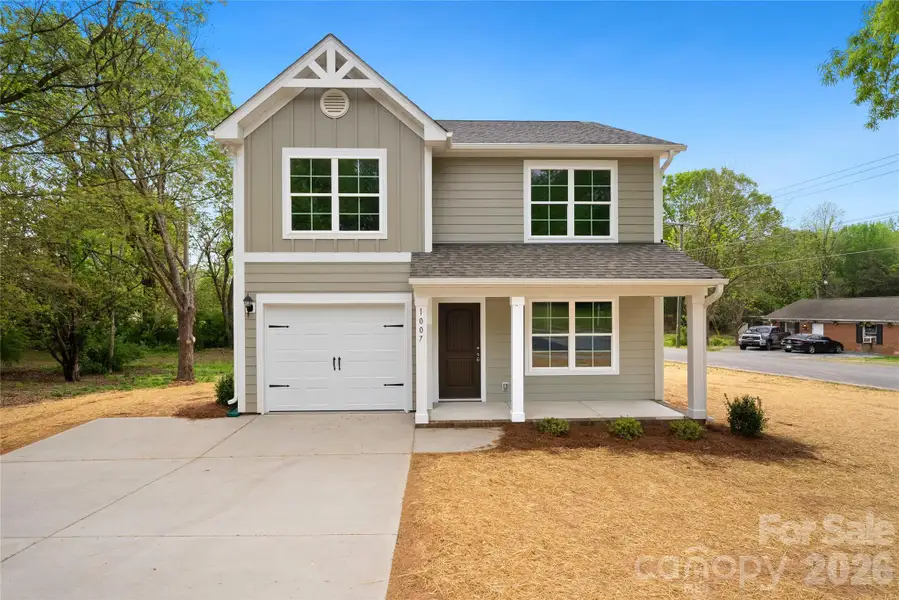 Front exterior of a new home in , Monroe, NC, highlighting curb appeal (Image 2). Front exterior of a new home in , Monroe, NC, highlighting curb appeal (Image 2).