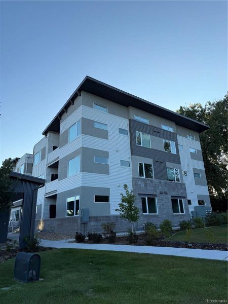 Front exterior of a new home in , Louisville, CO, highlighting curb appeal (Image 15). Front exterior of a new home in , Louisville, CO, highlighting curb appeal (Image 15).