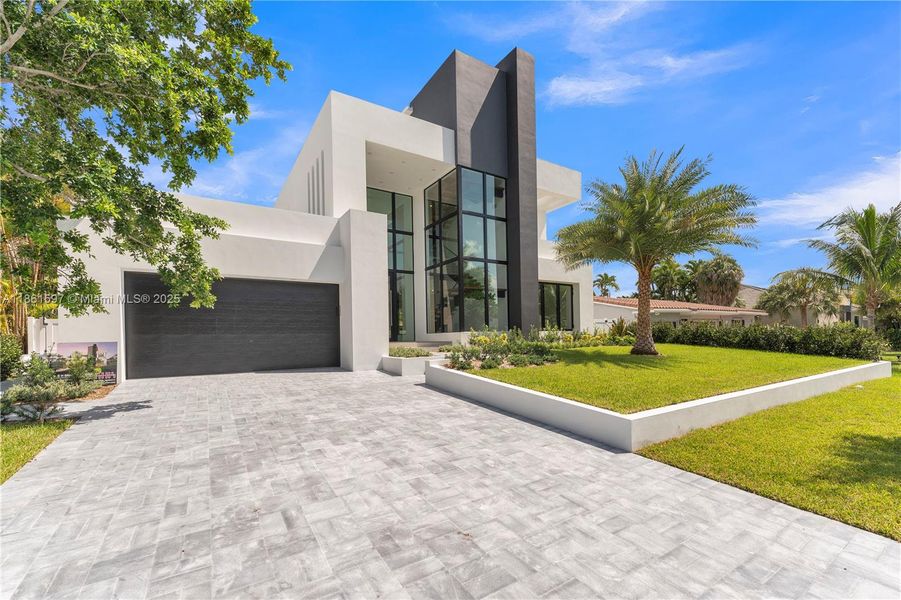 Front exterior of a new home in , Pompano Beach, FL, highlighting curb appeal (Image 21).