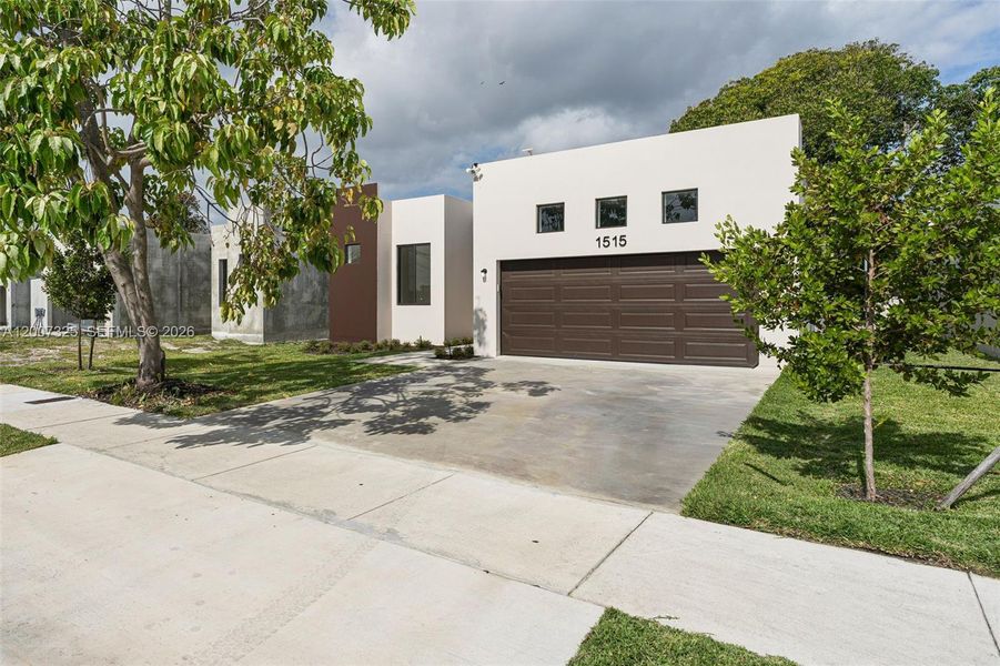 Front exterior of a new home in , Fort Lauderdale, FL, highlighting curb appeal (Image 1). Front exterior of a new home in , Fort Lauderdale, FL, highlighting curb appeal (Image 1).
