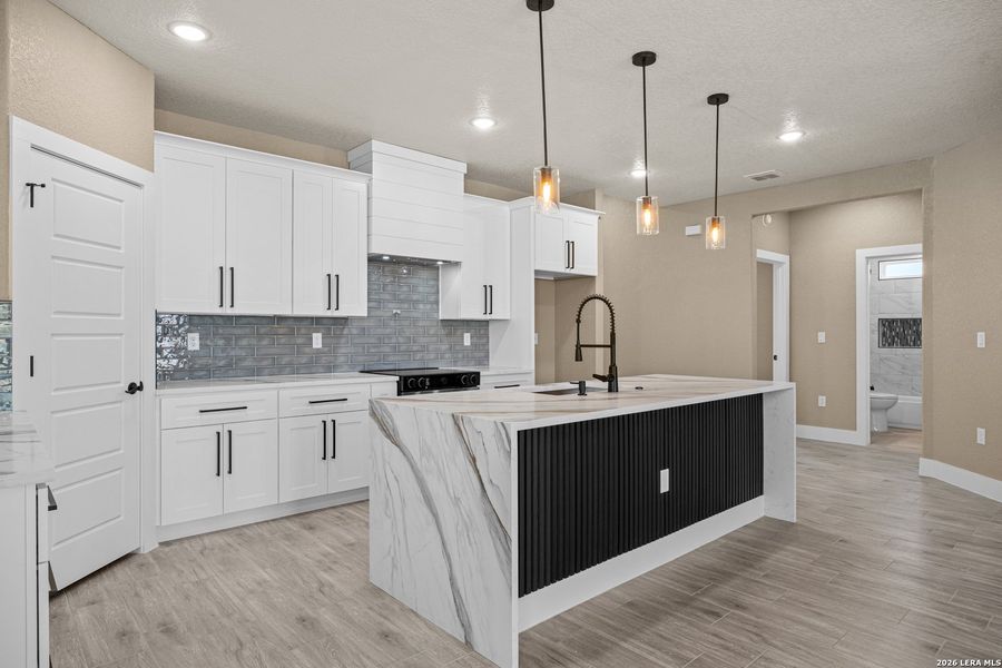 Furnished interior view inside a new home in , Atascosa (Image 6).