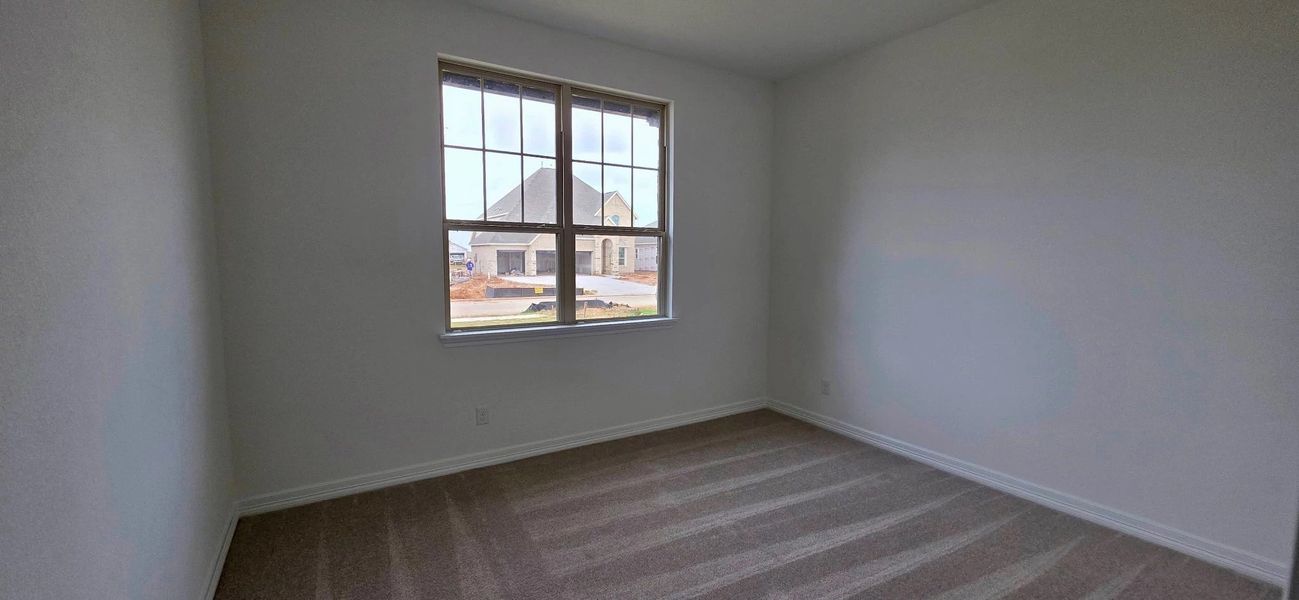 Spacious, unfurnished interior of a new home in Sunterra Lakes, Brookshire (Image 20).