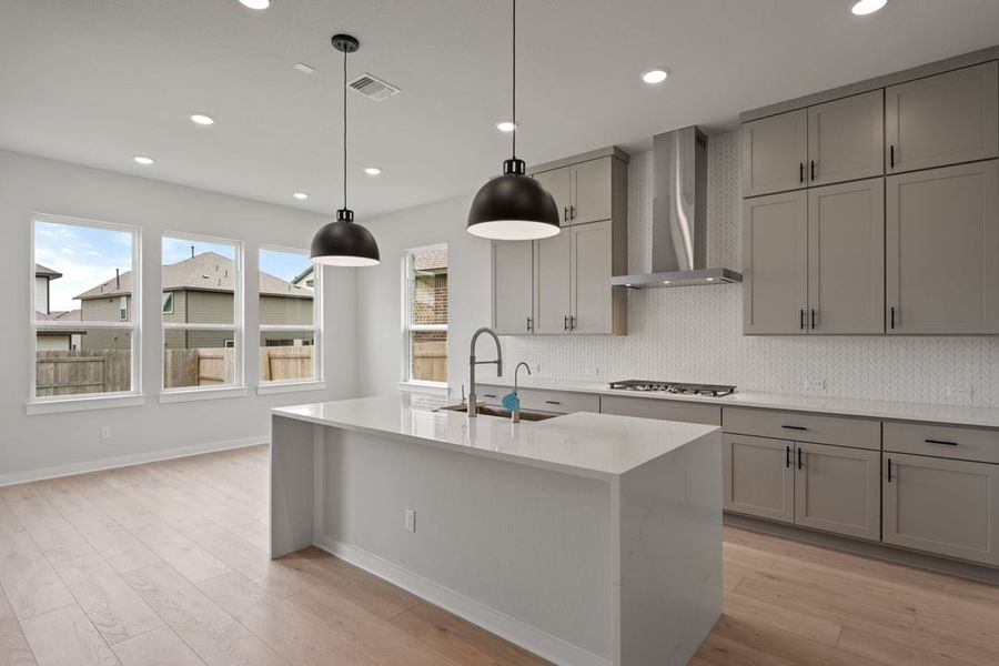 Furnished interior view inside a new home in Arbor Collection at Lariat, Liberty Hill (Image 12). Furnished interior view inside a new home in Arbor Collection at Lariat, Liberty Hill (Image 12).