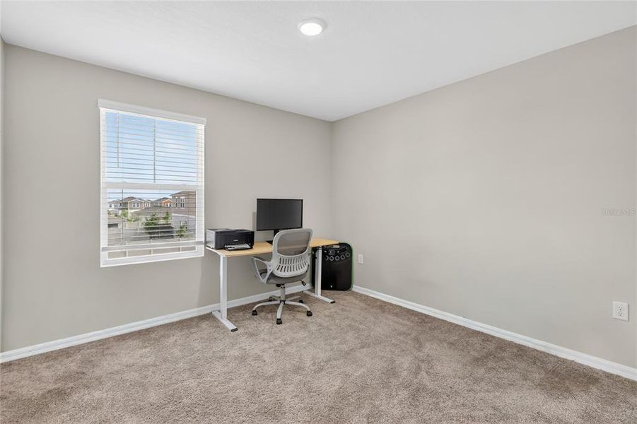 Furnished interior view inside a new home in Scenic Terrace, Haines City (Image 19).