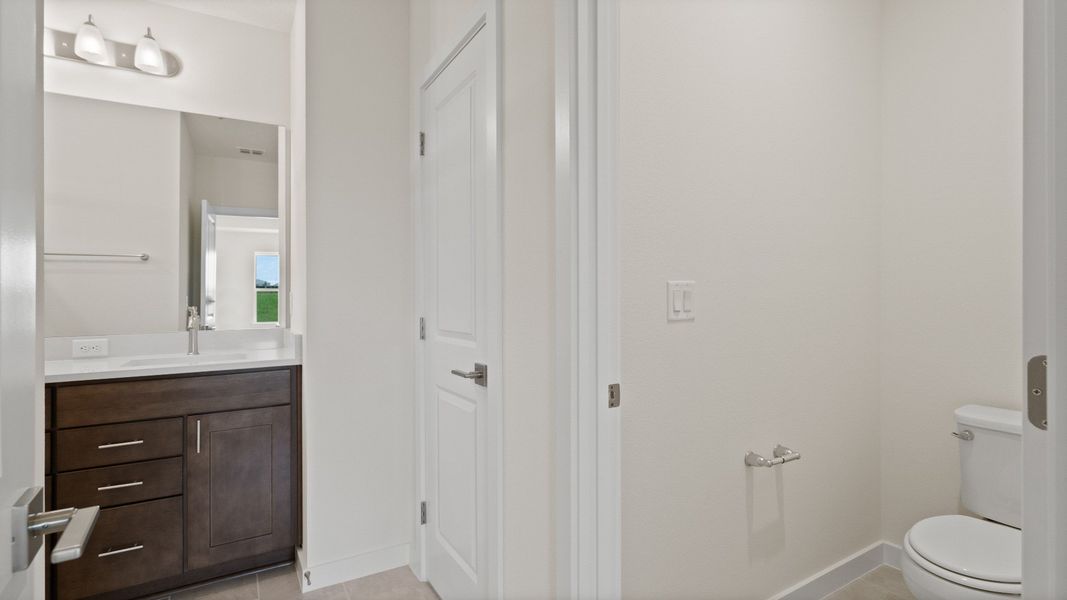 The Atwood Primary Bedroom with en suite bath by DRB Homes in Hamilton Bluff, Haines City, FL The Atwood Primary Bedroom with en suite bath by DRB Homes in Hamilton Bluff, Haines City, FL