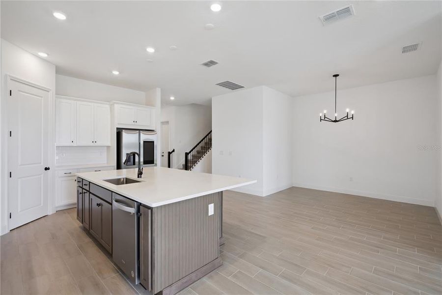 Furnished interior view inside a new home in Laureate Park, Orlando (Image 13).