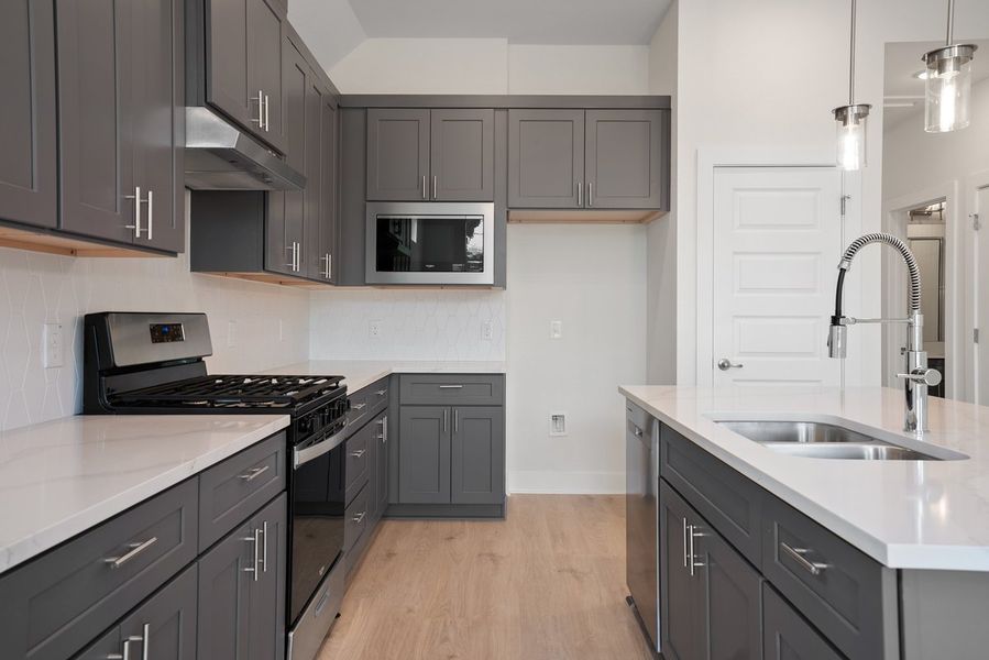 Furnished interior view inside a new home in Koenig Townhomes, Austin (Image 5). Furnished interior view inside a new home in Koenig Townhomes, Austin (Image 5).