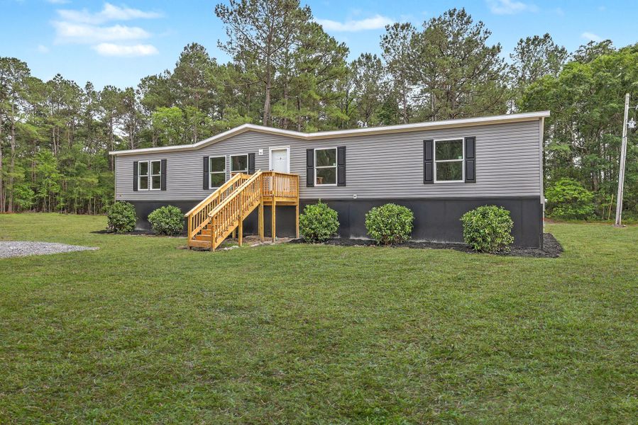 Exterior details and patio area of a home in , Ridgeville (Image 25).