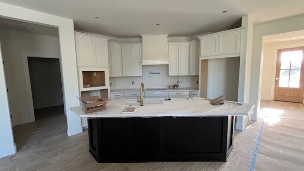 In-progress construction of a new home in Lakeside at Millican Reserve, College Station, TX (Image 12).