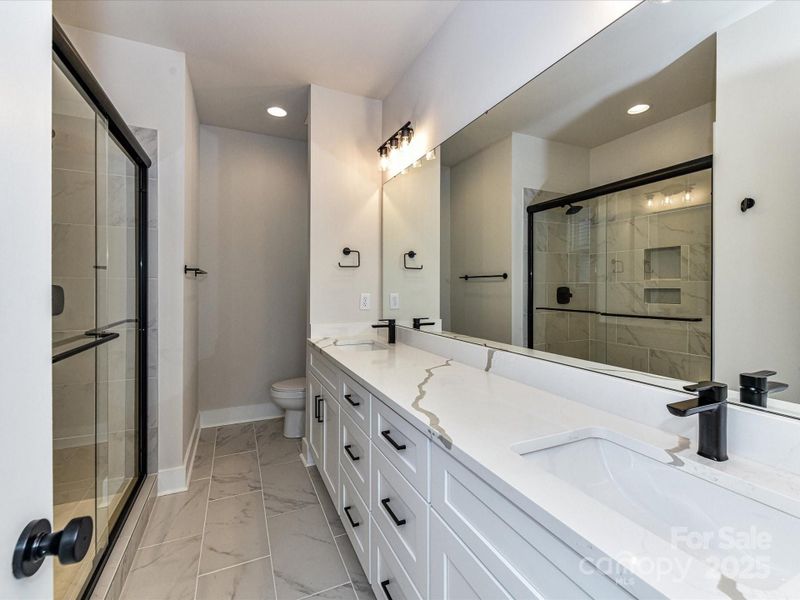 Furnished interior view inside a new home in North End Terraces, Charlotte (Image 5).