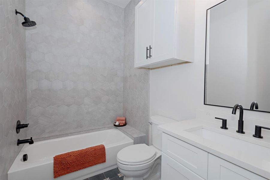 Modern High-End Finishes and calming tones elevate this Full Guest Bathroom. Modern High-End Finishes and calming tones elevate this Full Guest Bathroom.