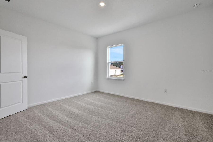 Spacious, unfurnished interior of a new home in Crossroads at Kelly Park, Apopka (Image 24). Spacious, unfurnished interior of a new home in Crossroads at Kelly Park, Apopka (Image 24).