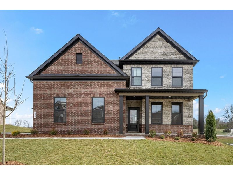 Front exterior of a new home in Benders Cove, Mount Juliet, TN, highlighting curb appeal (Image 1). Front exterior of a new home in Benders Cove, Mount Juliet, TN, highlighting curb appeal (Image 1).