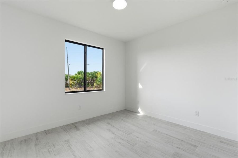 Spacious, unfurnished interior of a new home in , Port Charlotte (Image 43).
