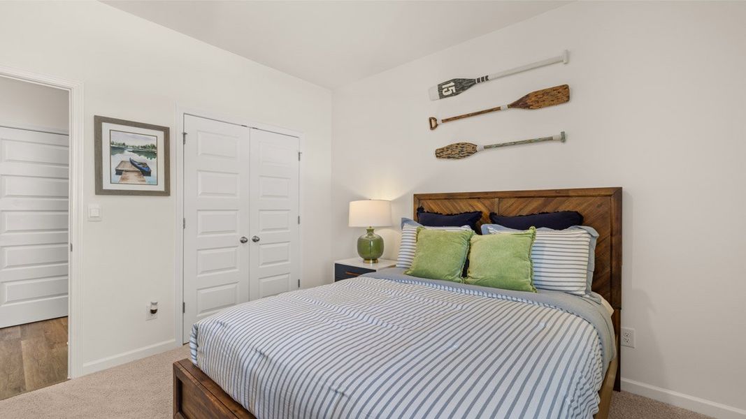 Representative furnished interior of a home built from the Denton by D.R. Horton in Jackson Landing, Jefferson (Image 25).