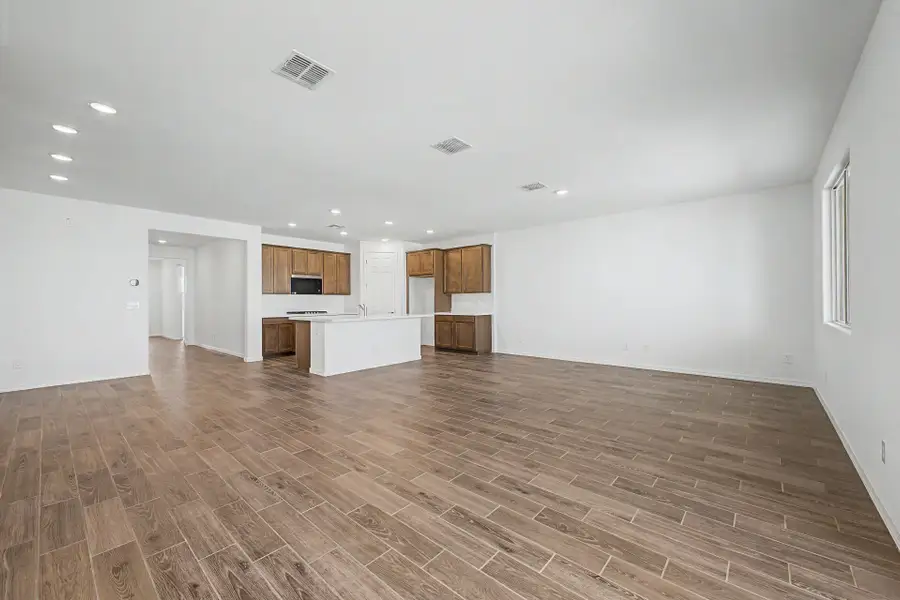 Spacious, unfurnished interior of a new home in Tyler Ranch, Buckeye (Image 10). Spacious, unfurnished interior of a new home in Tyler Ranch, Buckeye (Image 10).