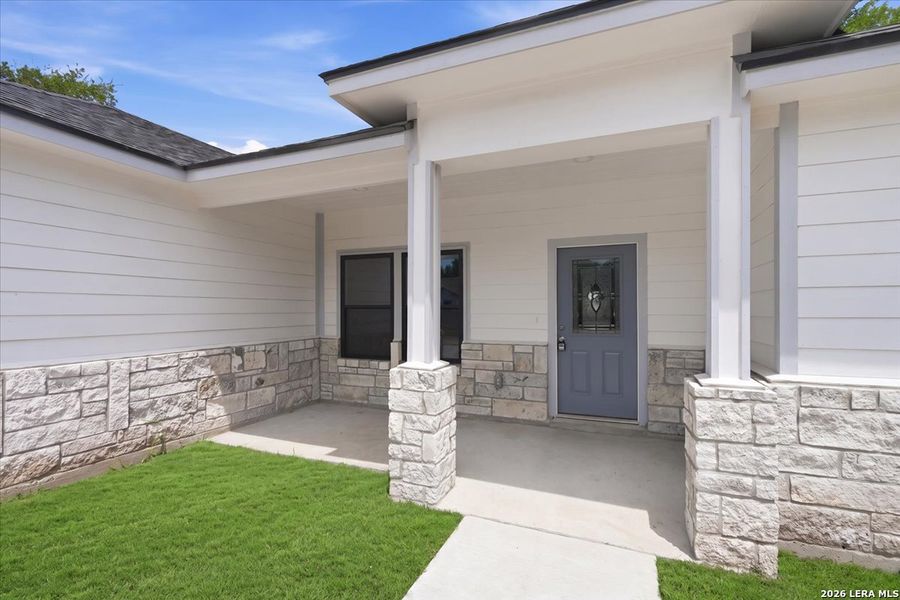 Exterior details and patio area of a home in , Beeville (Image 4).