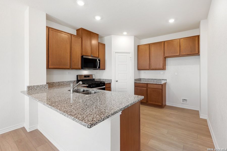 Furnished interior view inside a new home in Punta Verde, Converse (Image 9).