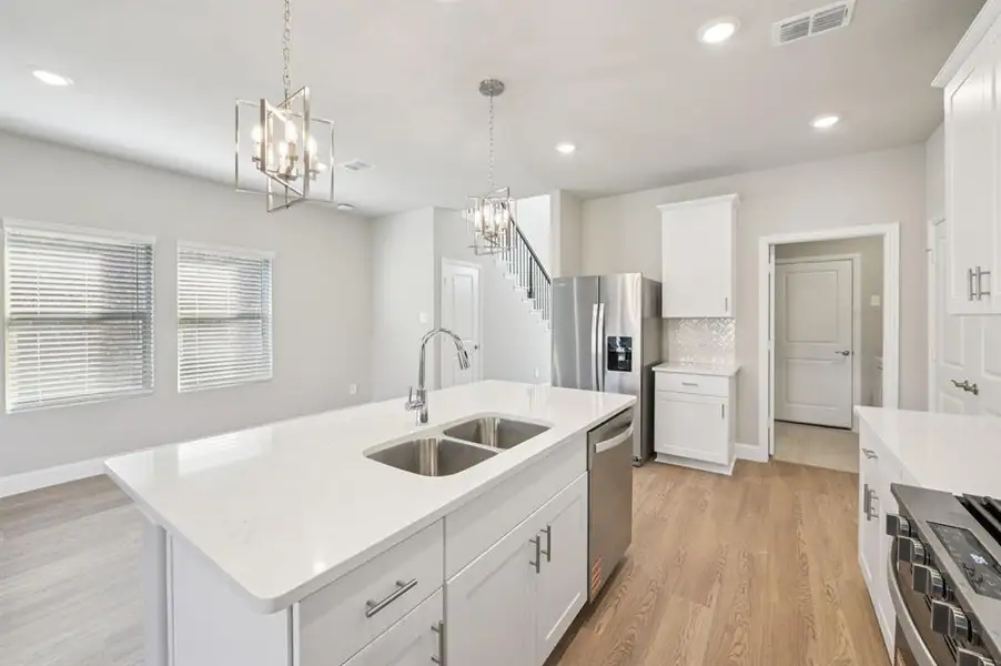 Photo is not of the actual home, but is an inspirational photo of builder’s model home and may depict options, furnishings, and/or decorator features that are not included.