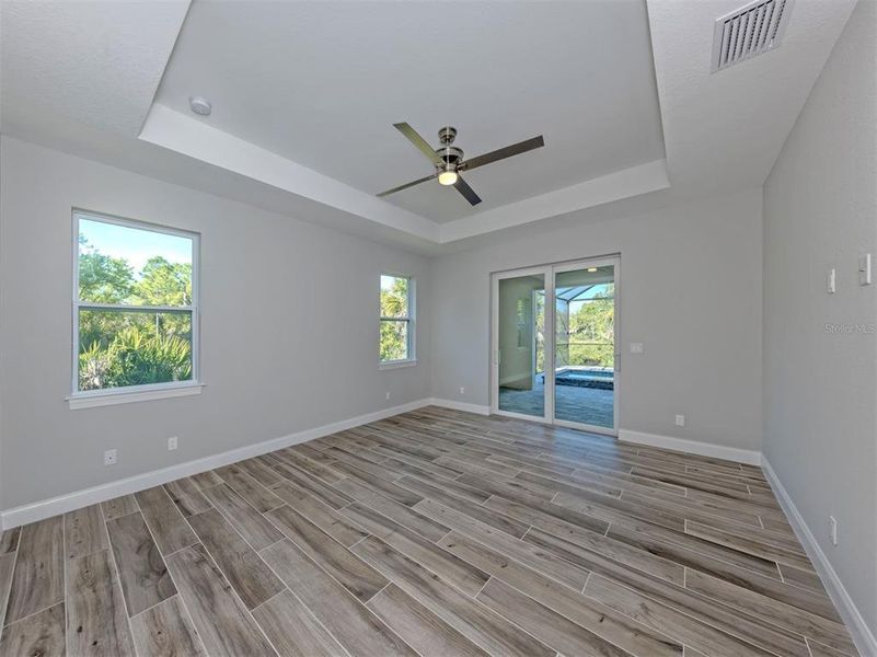 Spacious, unfurnished interior of a new home in , Port Charlotte (Image 18).