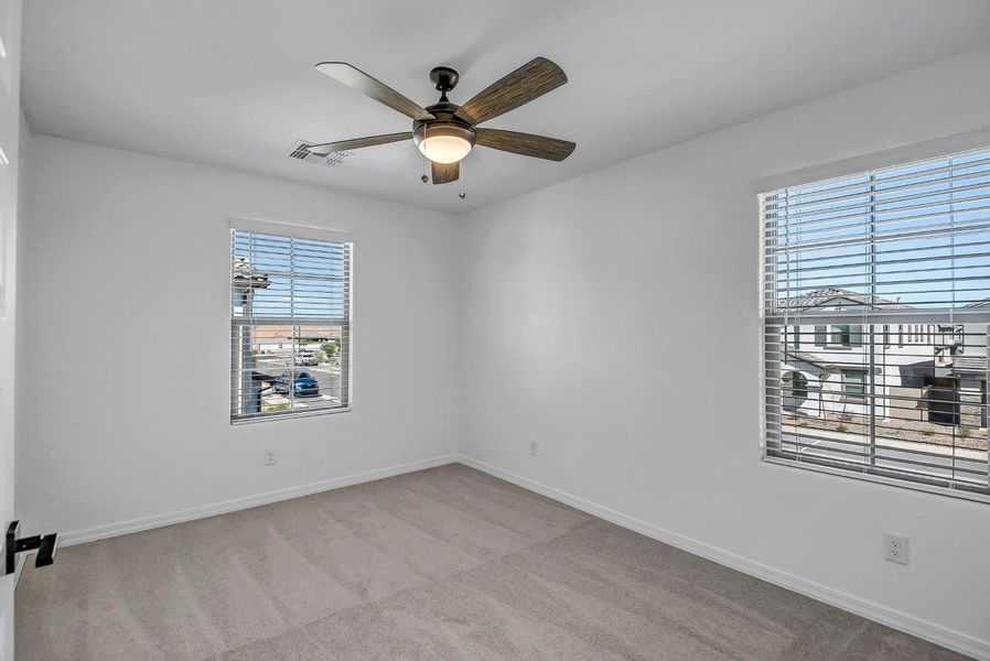 Spacious, unfurnished interior of a new home in Ironwood Villages at North Creek, Queen Creek (Image 24).