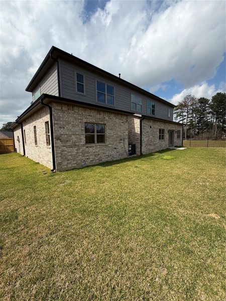 Exterior details and patio area of a home in , Spring (Image 4).