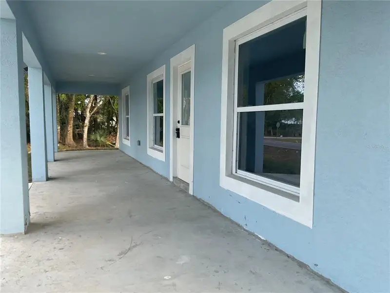 Exterior details and patio area of a home in , Okeechobee (Image 4).