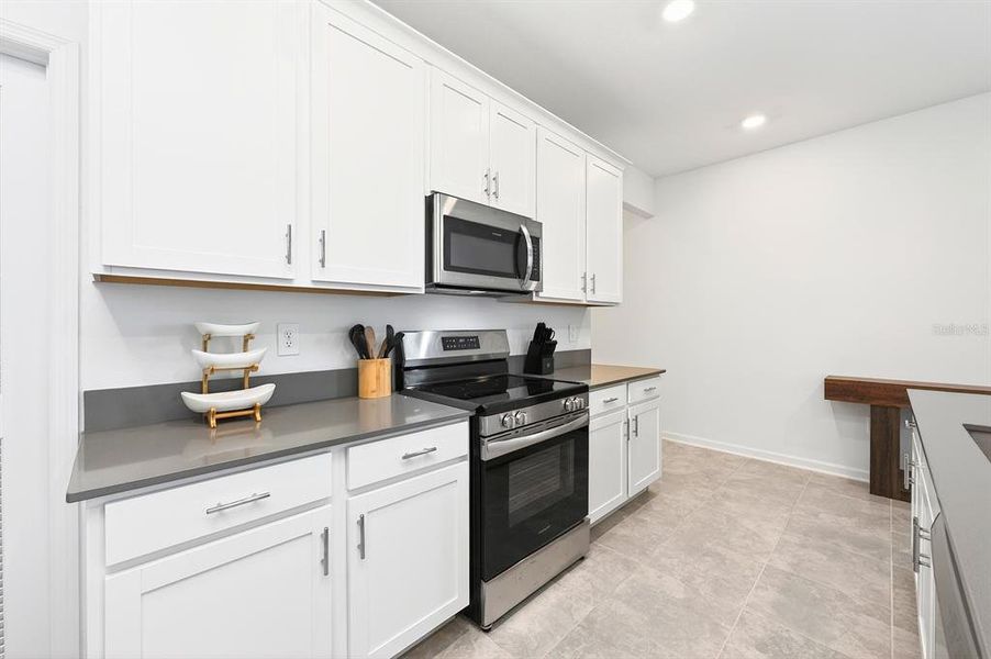 Furnished interior view inside a new home in Tohoqua, Kissimmee (Image 5).