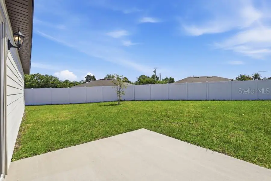 Exterior details and patio area of a home in Palm Coast, Palm Coast (Image 3).