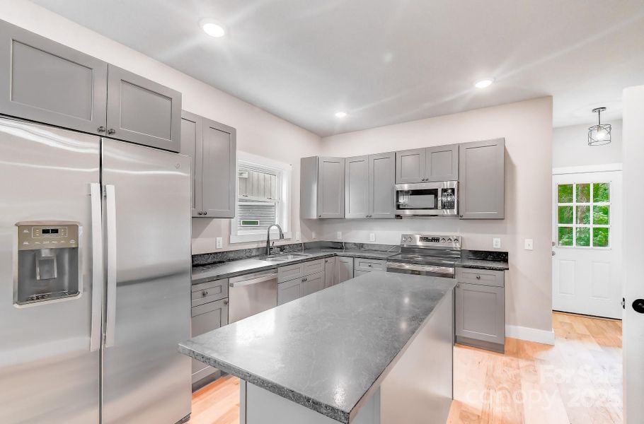 Furnished interior view inside a new home in , Asheville (Image 8).