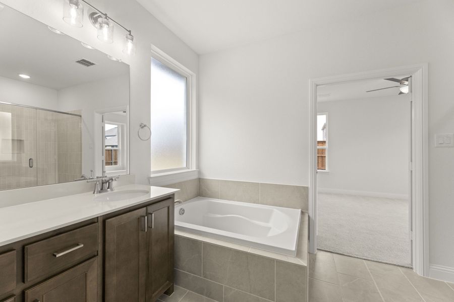Furnished interior view inside a new home in The Reserve at Spiritas Ranch, Little Elm (Image 9).
