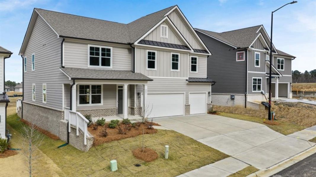 Front exterior of a new home in Hamptons at Riverwood South, Dallas, GA, highlighting curb appeal (Image 24).