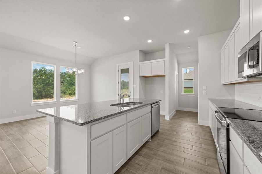 Furnished interior view inside a new home in Saddleback Estates, Boyd (Image 4).