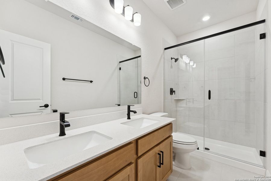 Furnished interior view inside a new home in Davis Ranch 50', San Antonio (Image 10).