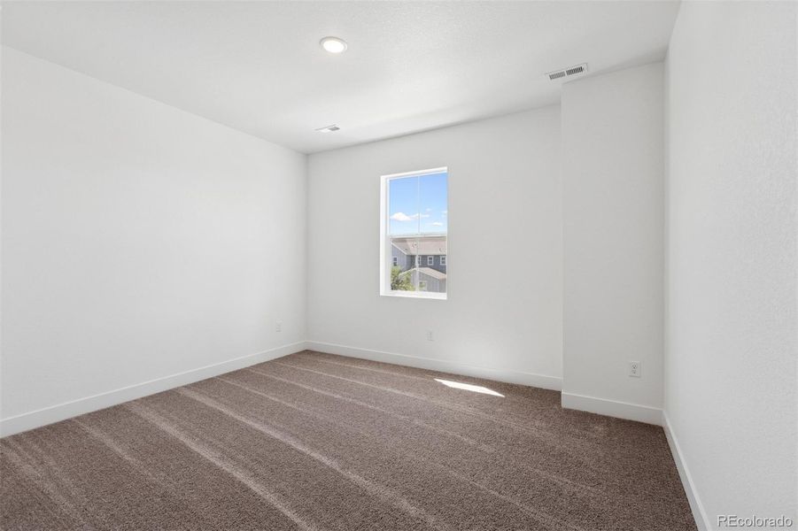 Spacious, unfurnished interior of a new home in Painted Prairie Cottage, Aurora (Image 18).