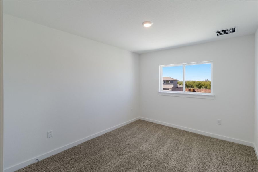 Spacious, unfurnished interior of a new home in Trails at Wildhorse, Austin (Image 19).