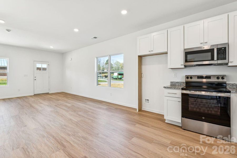 Spacious, unfurnished interior of a new home in , Bessemer City (Image 26).