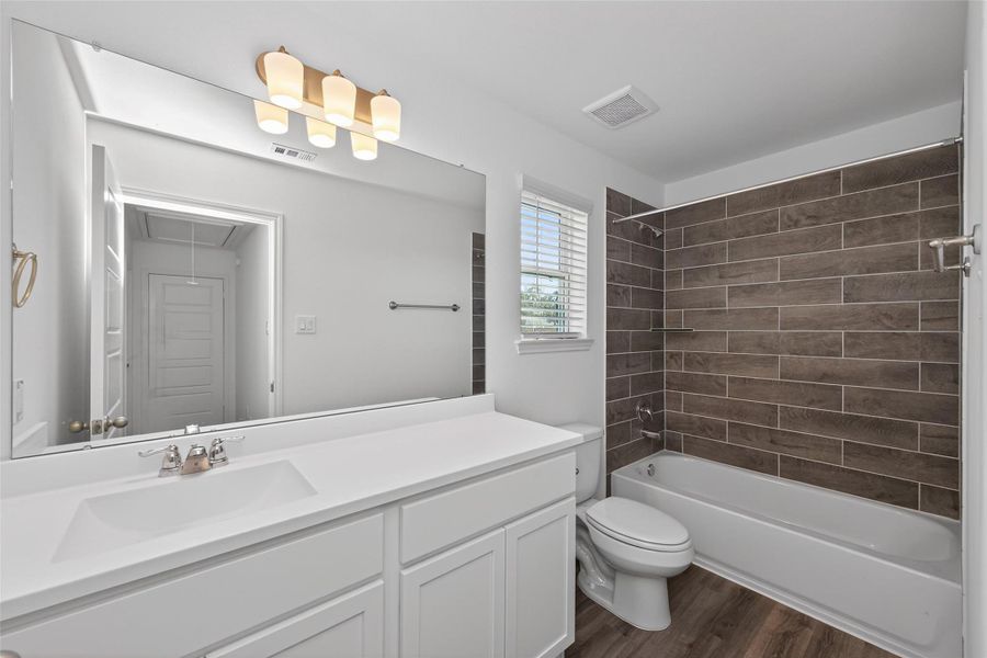 Furnished interior view inside a new home in Enclave at Willis, Willis (Image 14).