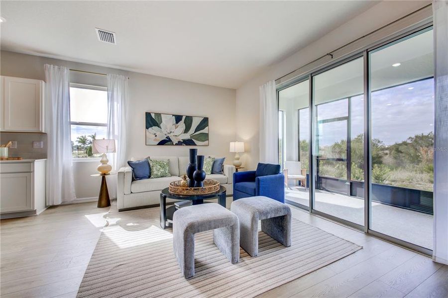 Furnished interior view inside a new home in The Gardens at Bay Street, Sarasota (Image 8).