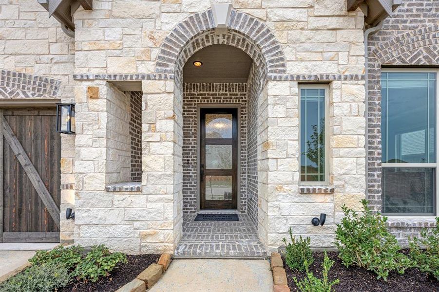 Exterior details and patio area of a home in Villages of Walnut Grove, Midlothian (Image 17).