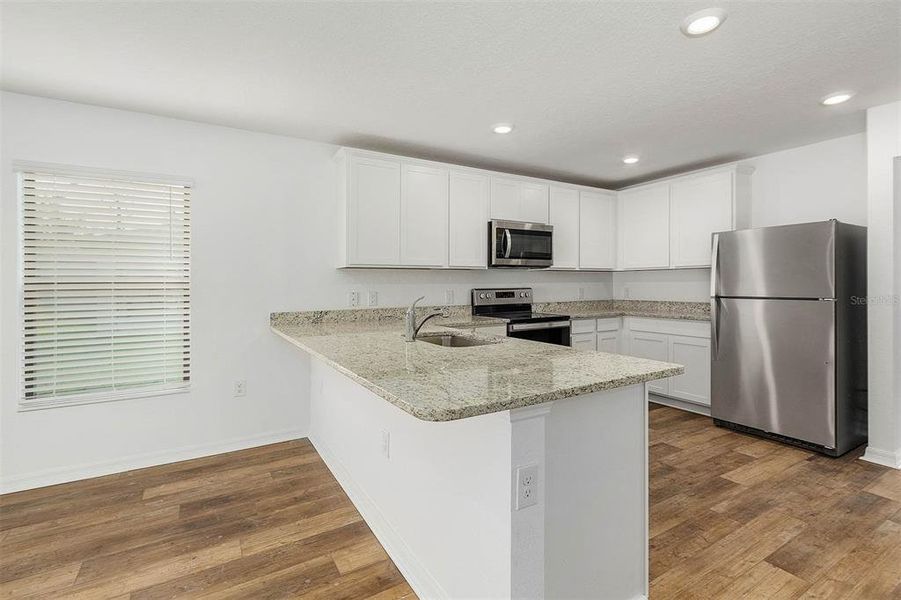 Furnished interior view inside a new home in , Port Charlotte (Image 6).