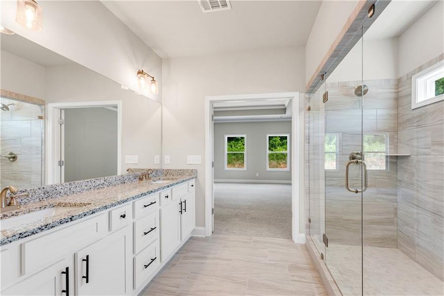 Furnished interior view inside a new home in Hidden Fields, Hoschton (Image 12).