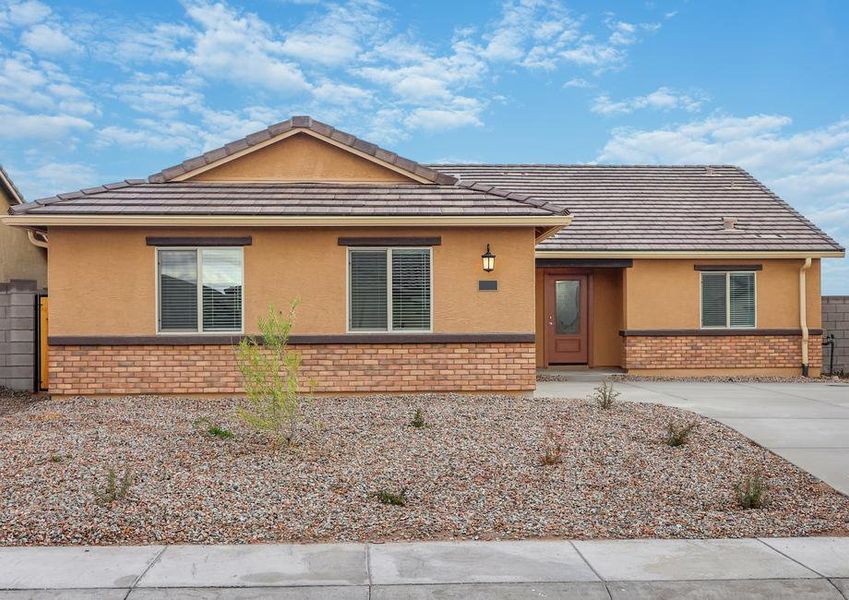 This home has a 2-car garage and gorgeous stone detailing.