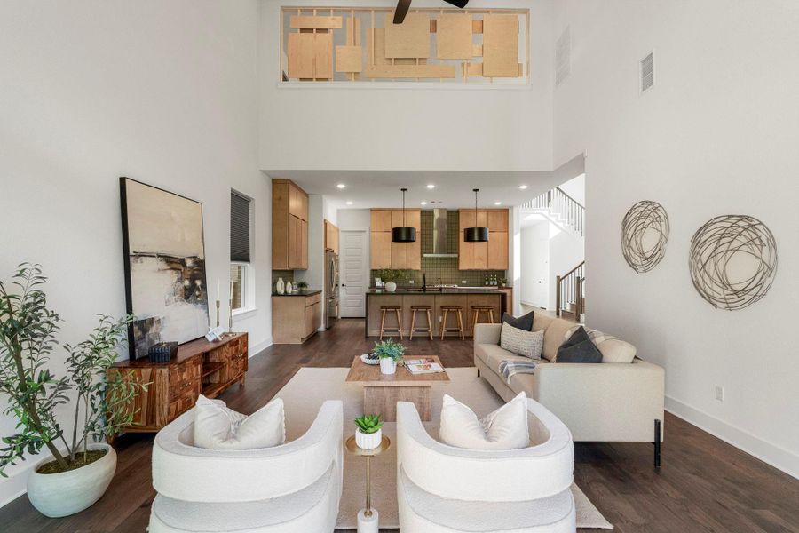An airy great room combines living, dining, and kitchen spaces for effortless entertaining.