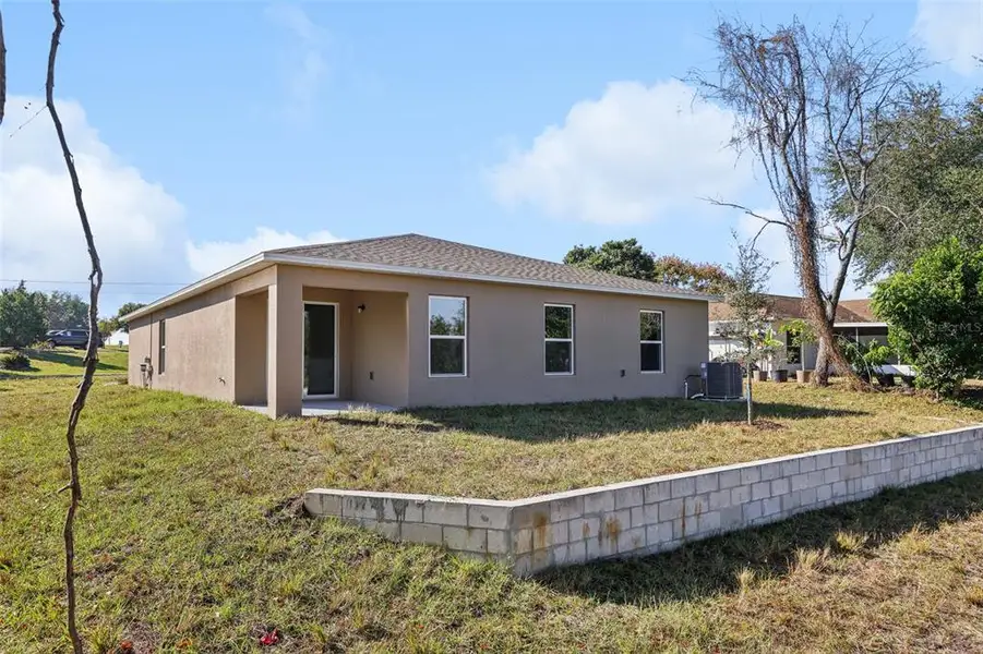 Exterior details and patio area of a home in Deltona Classic, Deltona (Image 9). Exterior details and patio area of a home in Deltona Classic, Deltona (Image 9).