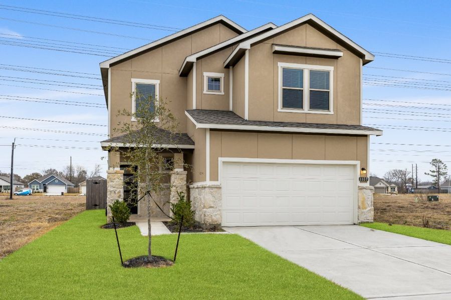 Front exterior of a new home in Glendale Lakes, Rosharon, TX, highlighting curb appeal (Image 34). Front exterior of a new home in Glendale Lakes, Rosharon, TX, highlighting curb appeal (Image 34).