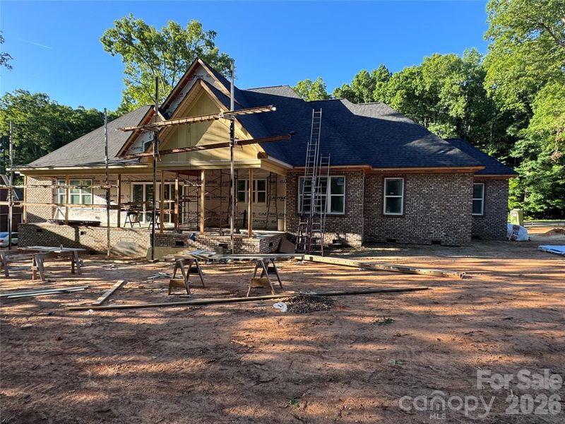Back Elevation- screened porch on the right and open porch on the left.