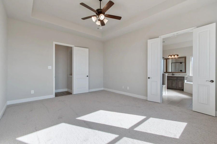 Primary Bedroom | Concept 2586 at Hidden Creek Estates in Van Alstyne, TX by Landsea Homes